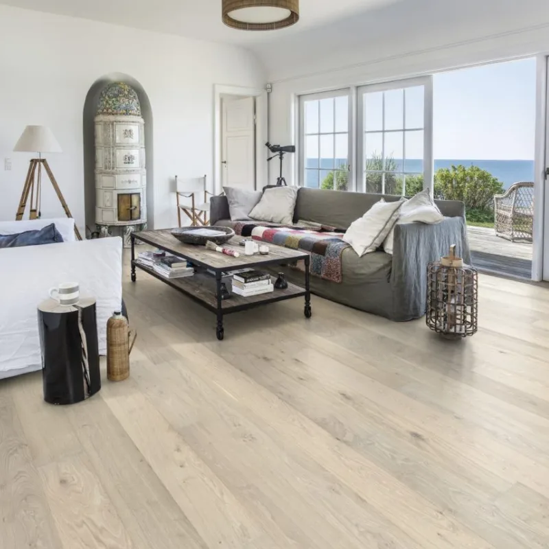 White oak plank flooring with light natural tones, subtle wood grain, and a clean modern finish look